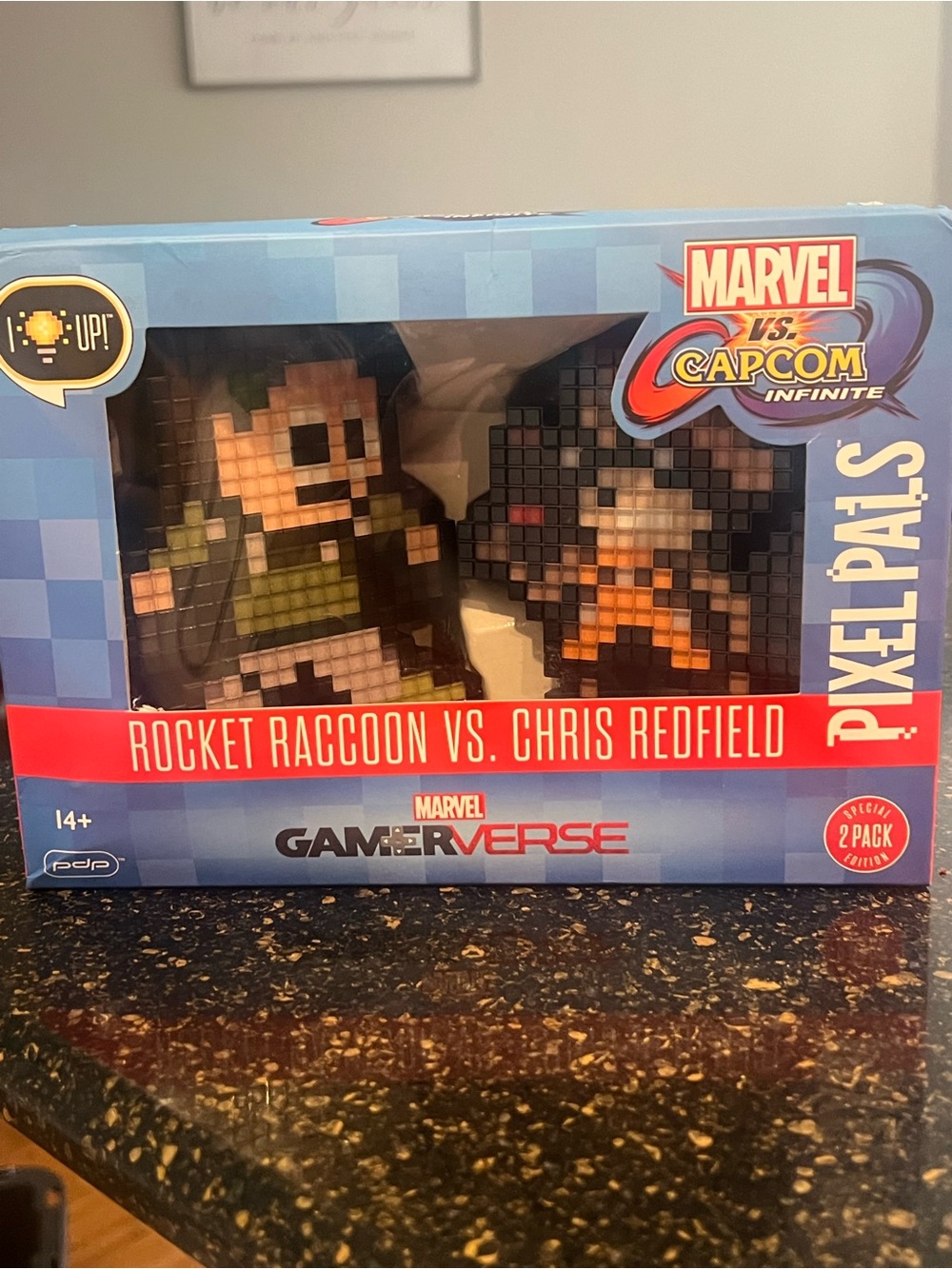 Marvel Pixel Pals Rocket Raccoon vs. Chris Redfield - Blue Red Black Orange